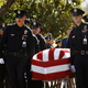 Los Angeles Police Department officers carry the Officer Houston R. Tipping’s casket at the beginning of his memorial service in June.